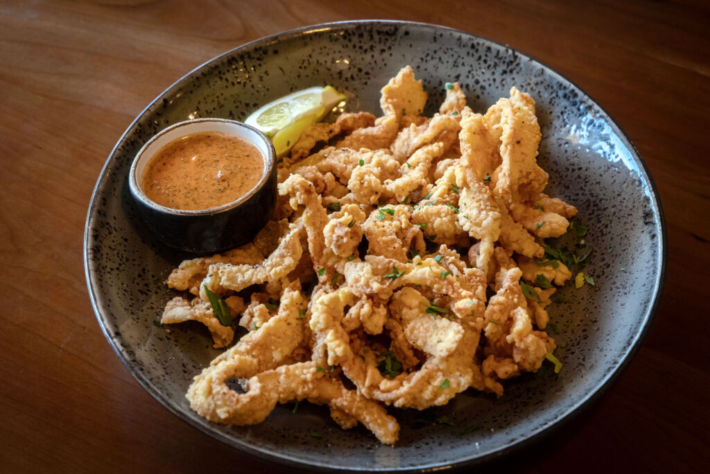 https://roartofino.com/wp-content/uploads/2024/12/Calamari-2-1024x683.jpg