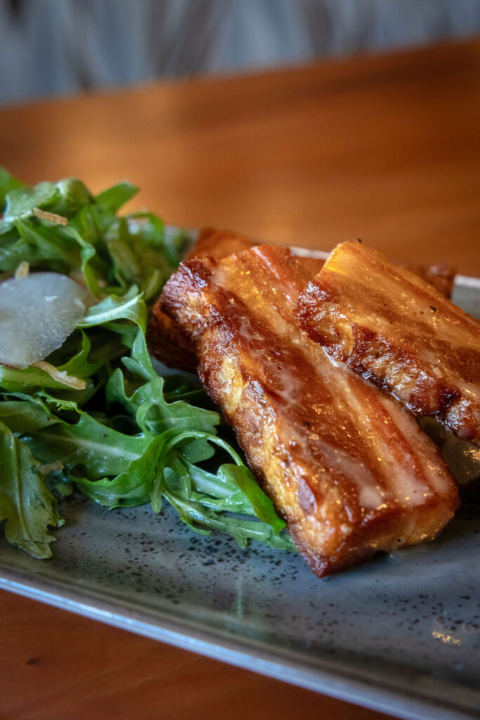 https://roartofino.com/wp-content/uploads/2024/12/Crispy-pork-belly-2-683x1024.jpg